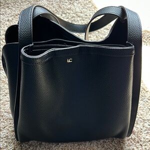 Liz Claiborne black purse in excellent condition.